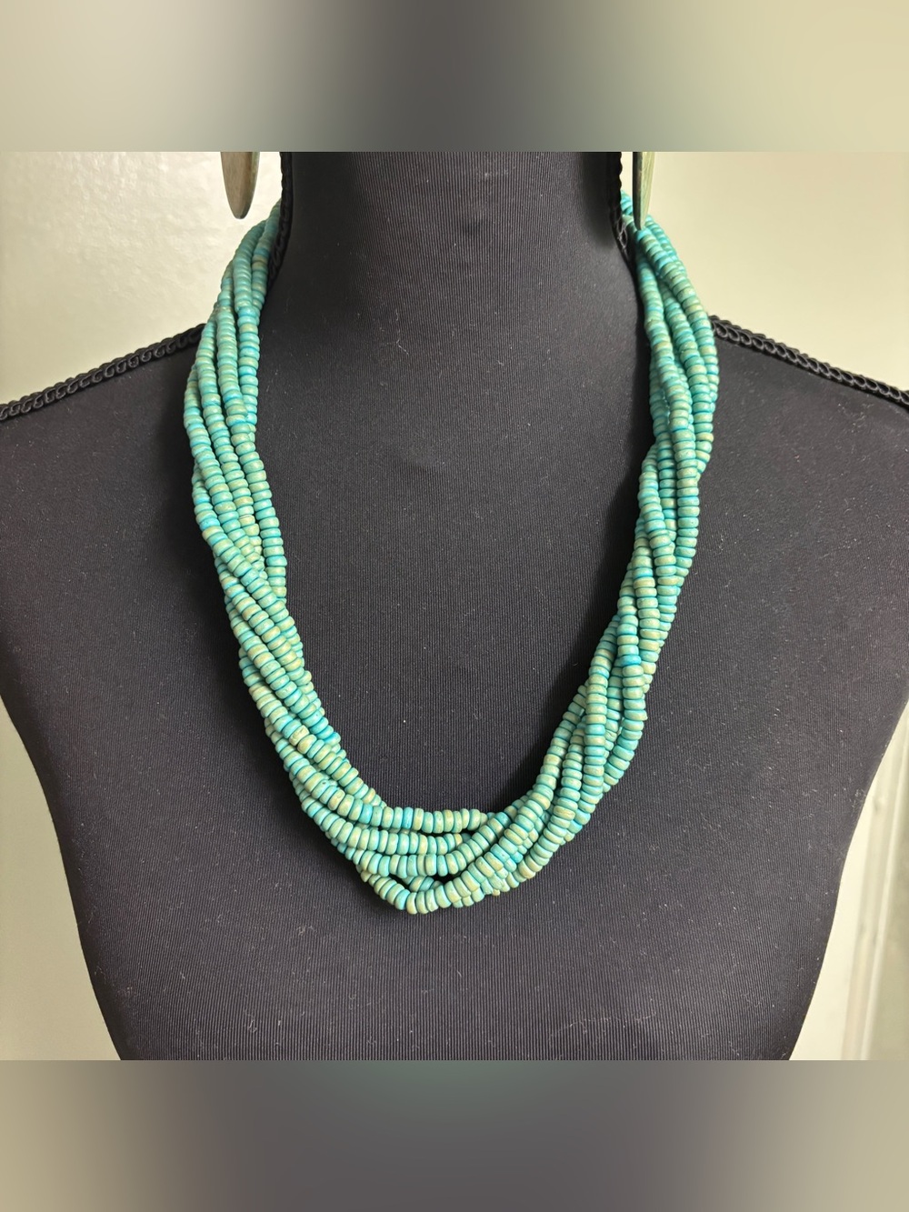 Vintage Elegant turquoise multi-strand wood beaded necklace and earrings.